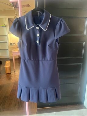Likely Navy Dress with Pearl Collar and Floral Buttons